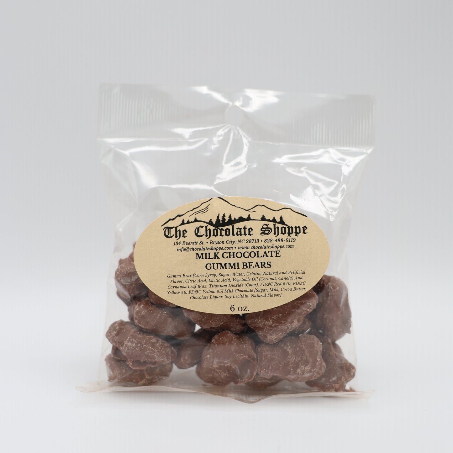 Milk chocolate covered gummi bears with chewy fruit center