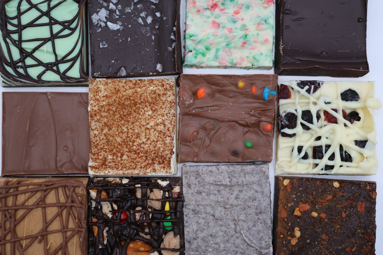 Collection of custom chocolate bars with a variety of mixins