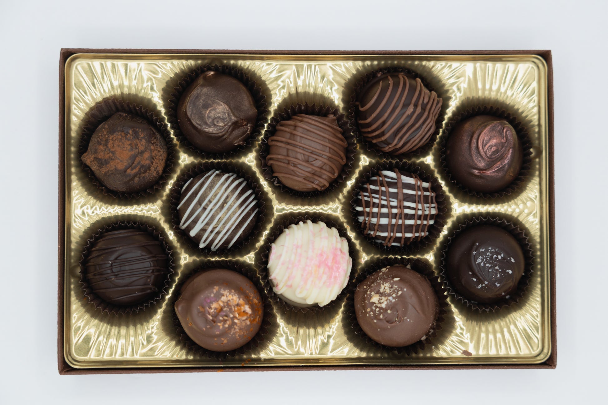 12 count chocolate truffle assortment in a gold gift box