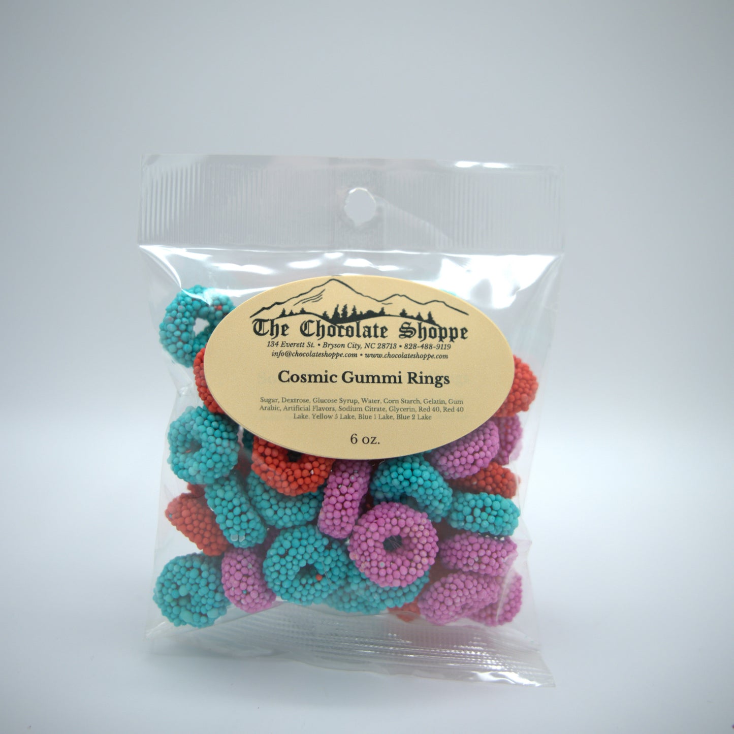 Cosmic gummi rings coated in colorful crunchy candy pieces