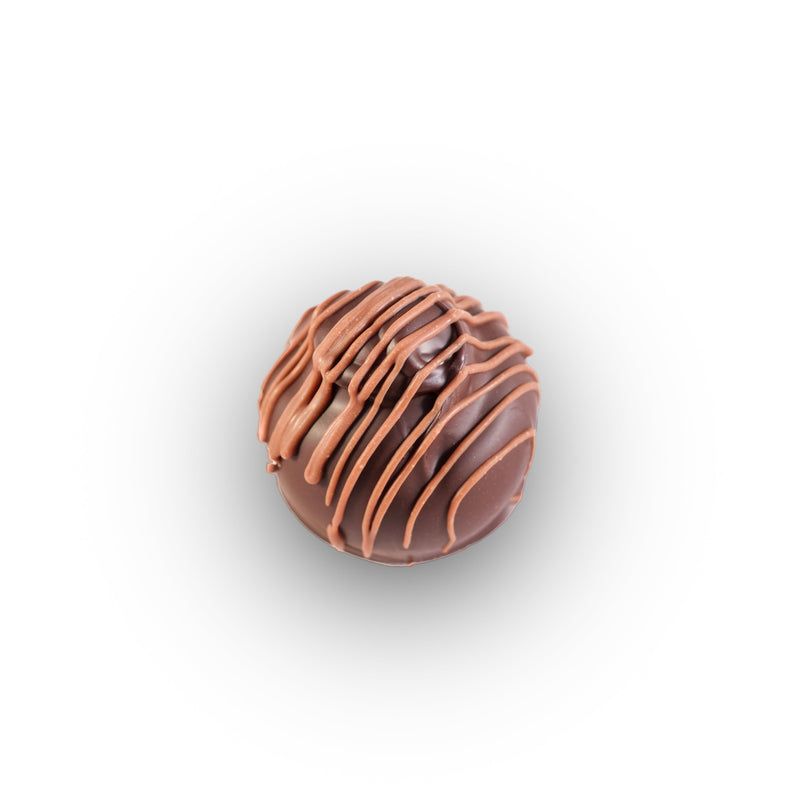 Raspberry chocolate truffle with fruit-infused ganache center