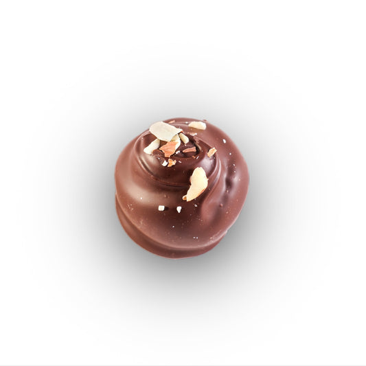Handcrafted amaretto chocolate truffle with almond-infused ganache