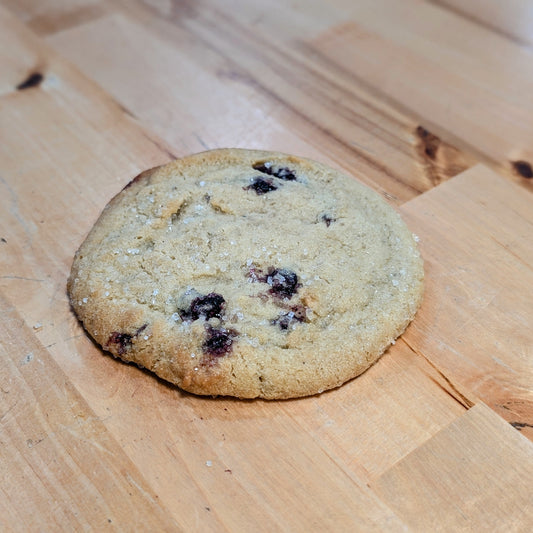 Blueberry cookie on a wooden surface