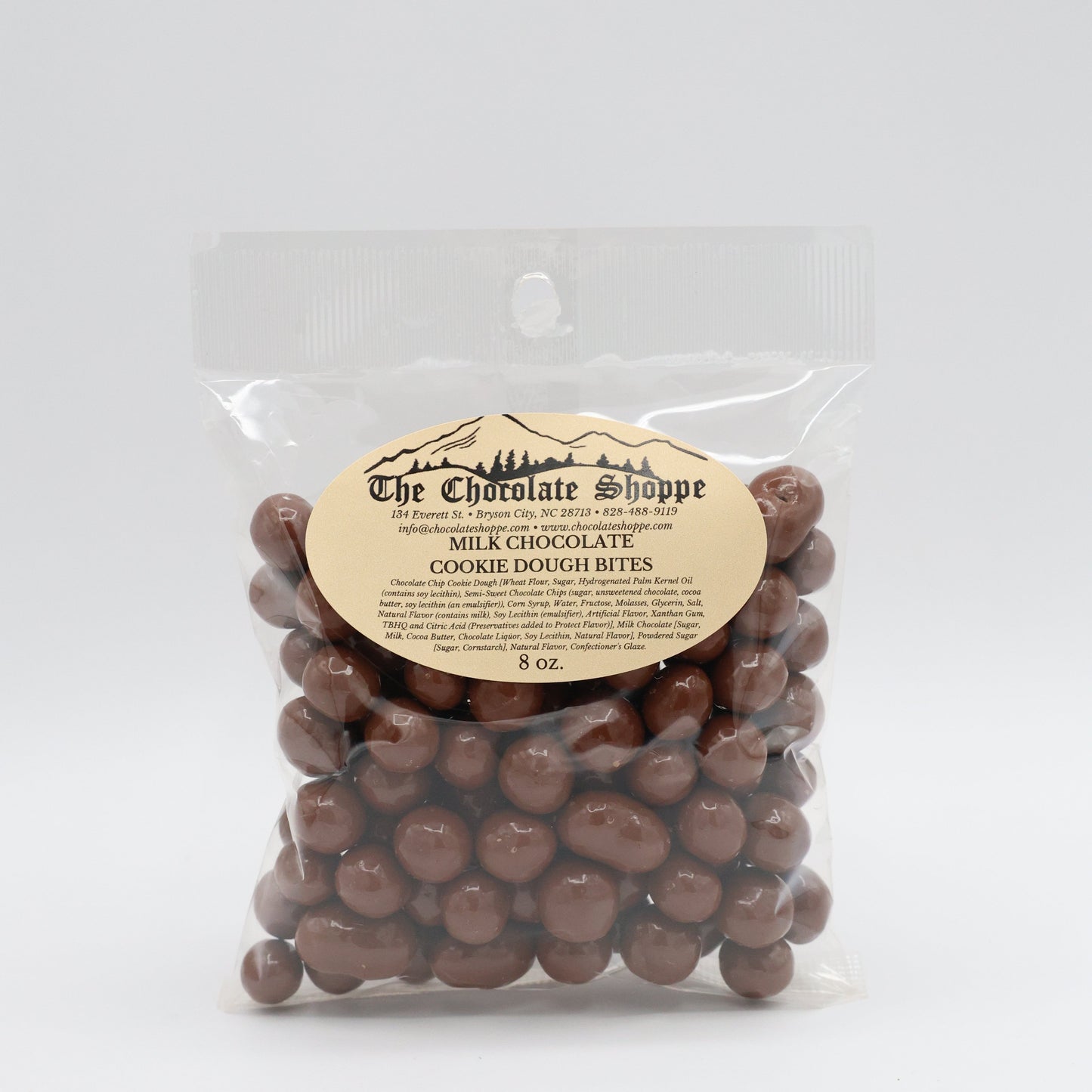 Chocolate covered cookie dough bites with smooth milk chocolate coating