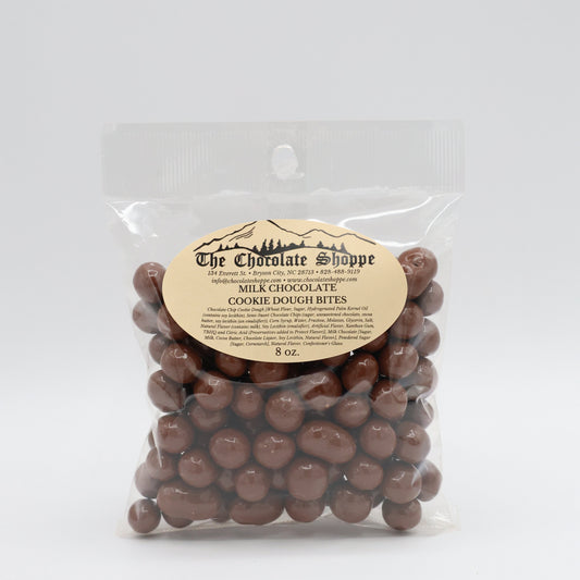 Chocolate covered cookie dough bites with smooth milk chocolate coating