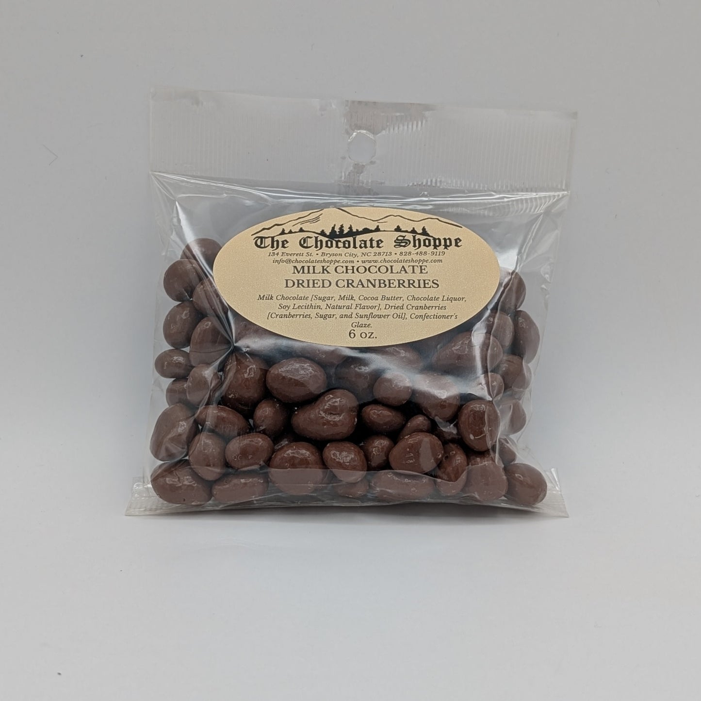 Packaged chocolate covered treats with a label on a white background