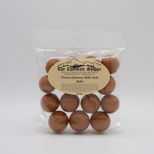 Peanut buttery malt balls coated in milk chocolate with crunchy center