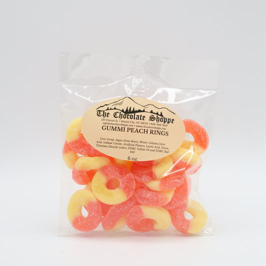 Peach gummi rings coated in sugar with bright orange color