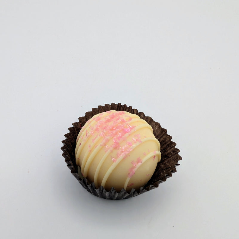 Strawberry cream truffle with berry-infused chocolate ganache